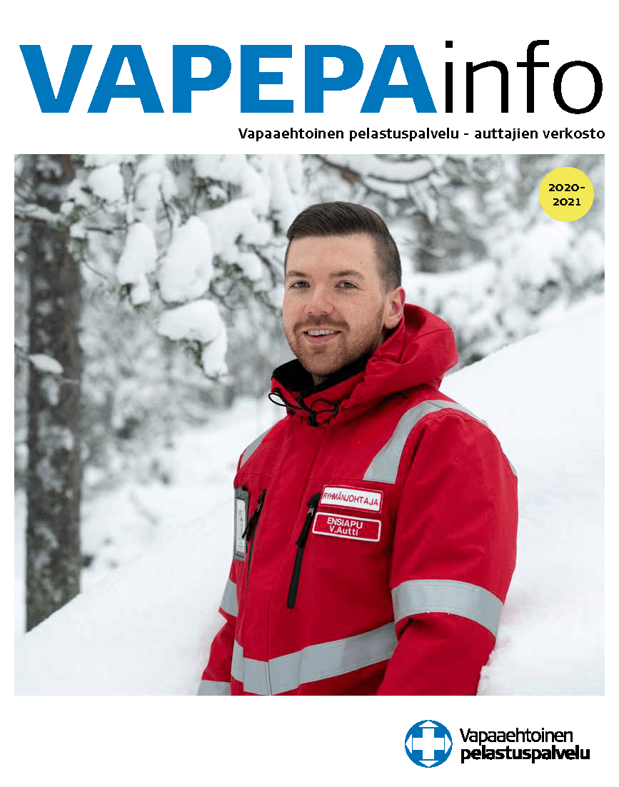 Lehden kansikuvassa ensihoitaja lumisessa maastossa